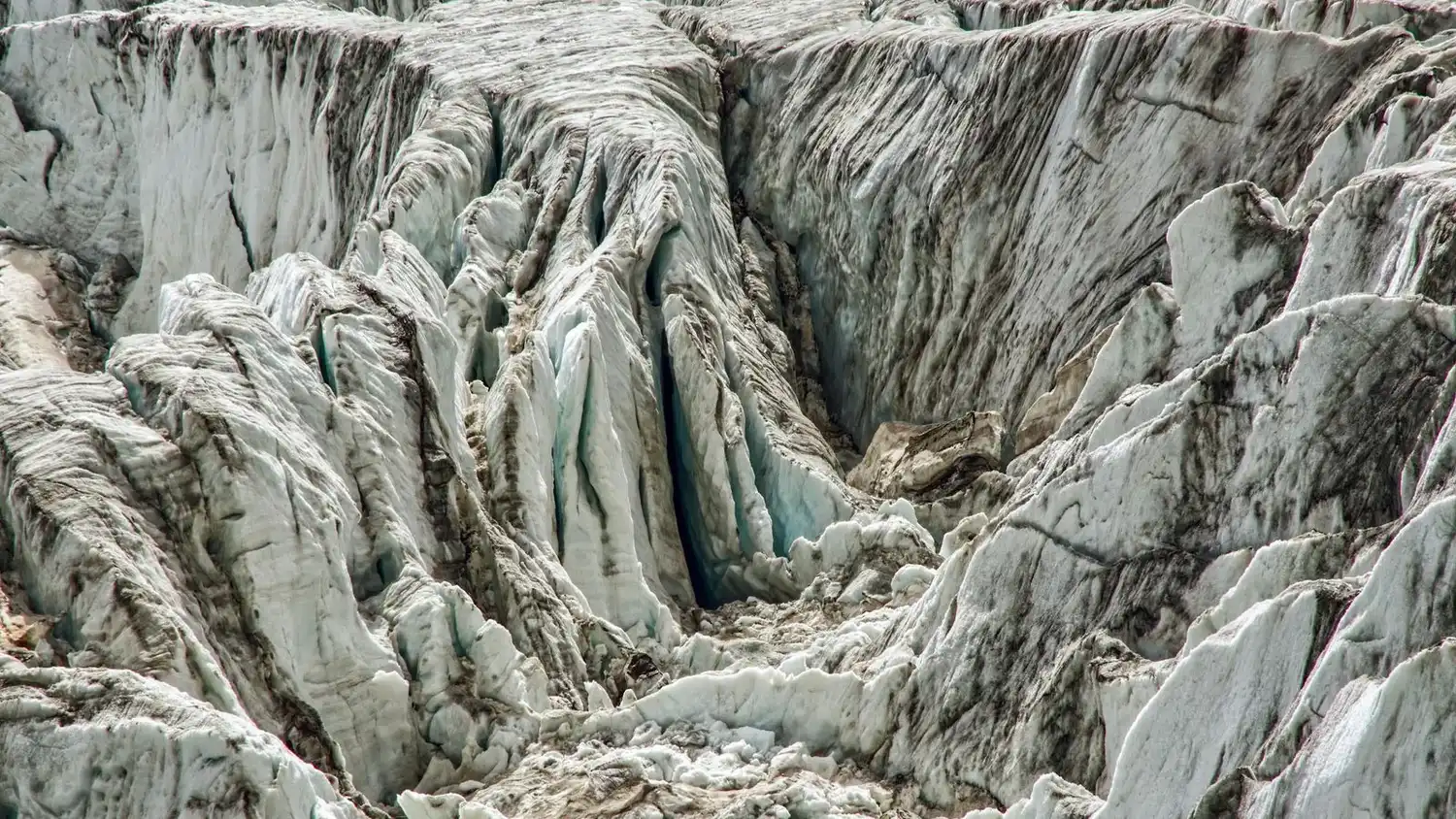 A detailed view of rugged ice crevasses and glacial formations showcasing nature's winter beauty.